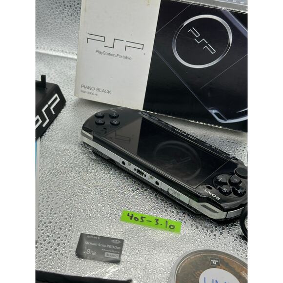 Black psp 3000 w/charger,game, memory card & new battery w/ box and manual - Picture 6 of 8